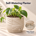 Textured Tessaro self-watering planter with a leafy plant and an inset showing the reservoir and wick system.