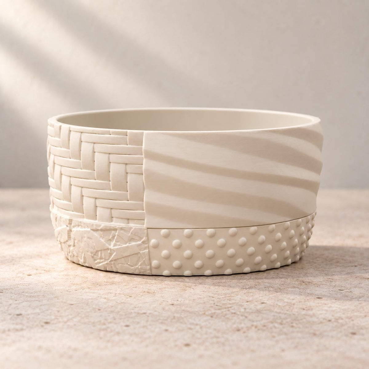 Product detail of the cream Tessaro shallow bonsai planter and its patchwork-textured design.