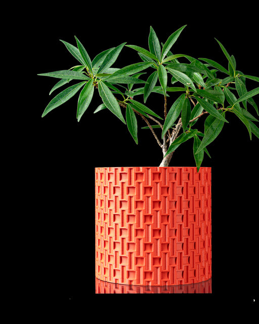 Tile cylindrical textured planter styled with indoor plant