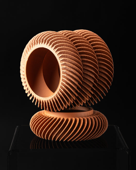 Toren spiral ribbed planter showing two-piece construction, angled view