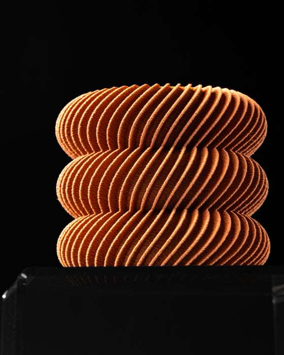 Toren LUX planter side view with three rounded spiral tiers