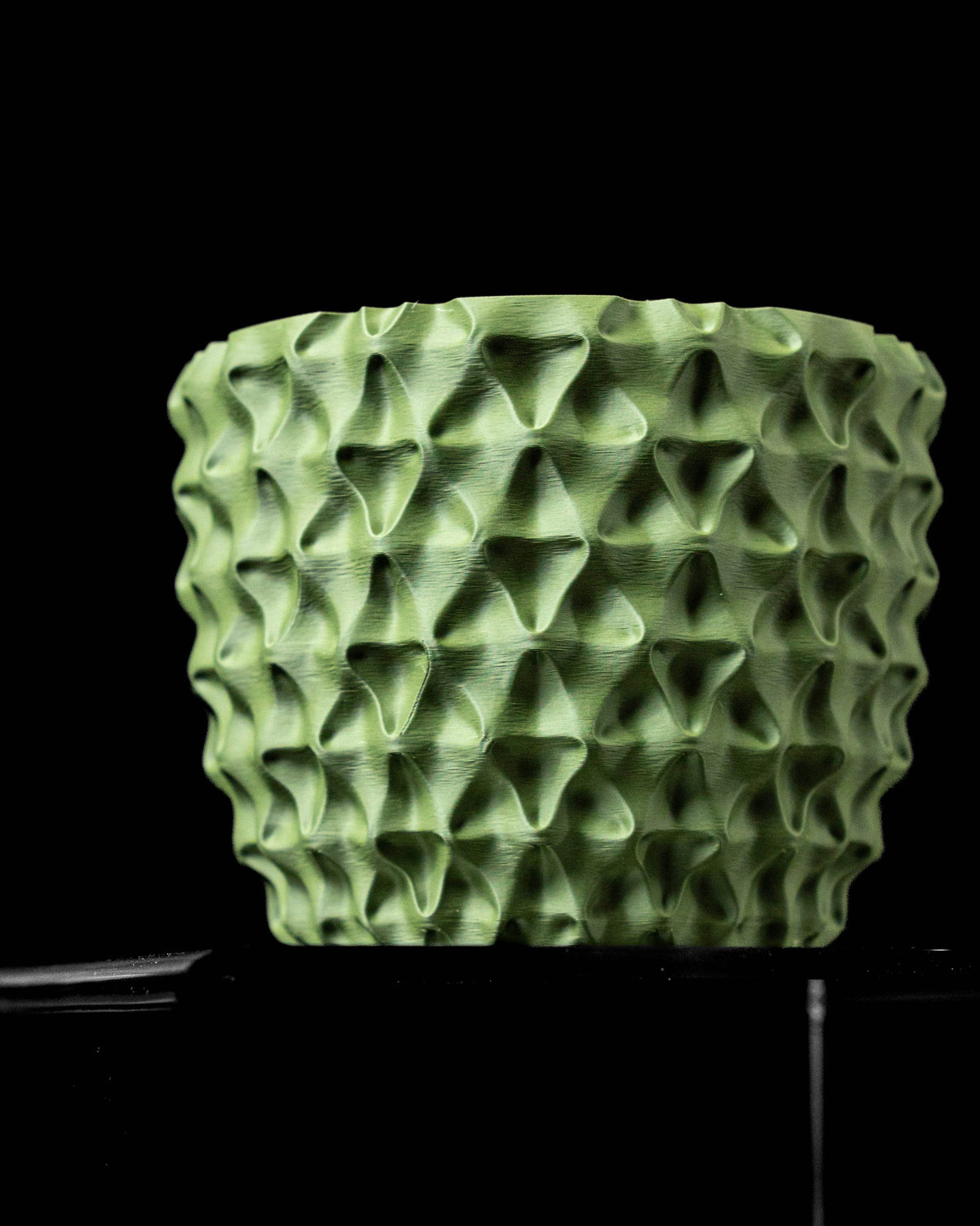 TriWave textured round indoor planter pot, front view