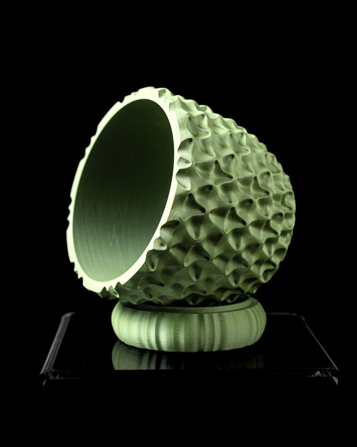 TriWave indoor planter tilted view showing opening and sculptural texture