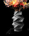 Twis twisted geometric vase with flowers, front view