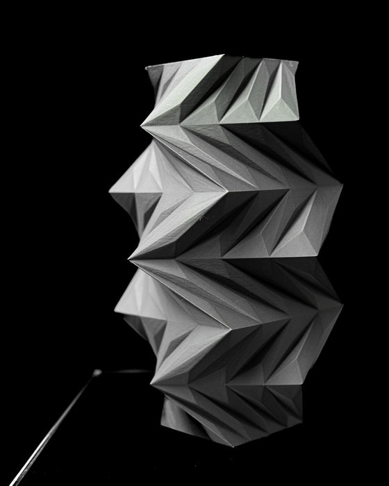 Twis geometric vase close-up showing folded angular form