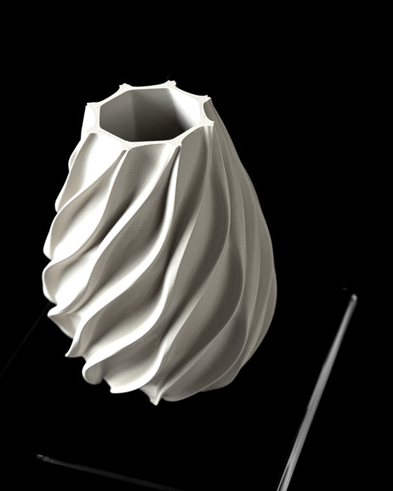 Twisted spiral vase angled view showing sculptural opening