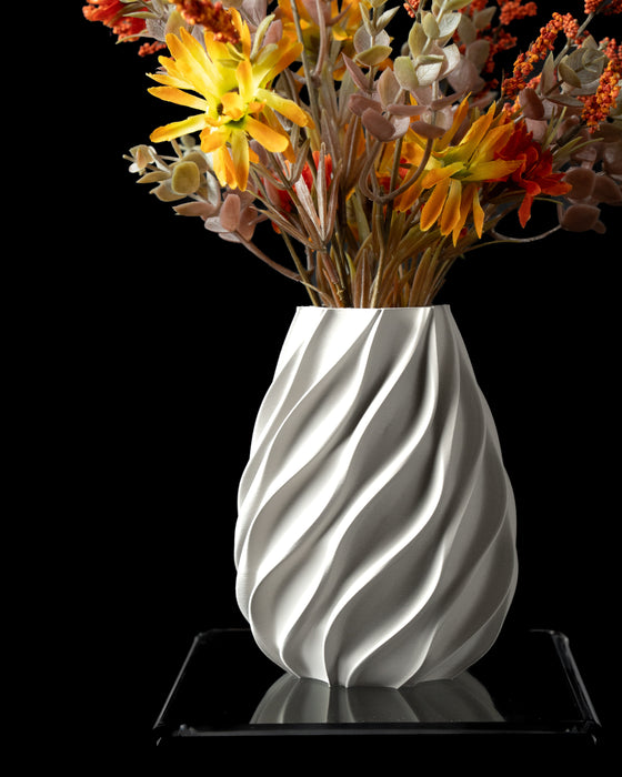 Twisted fluted vase styled with dried flowers