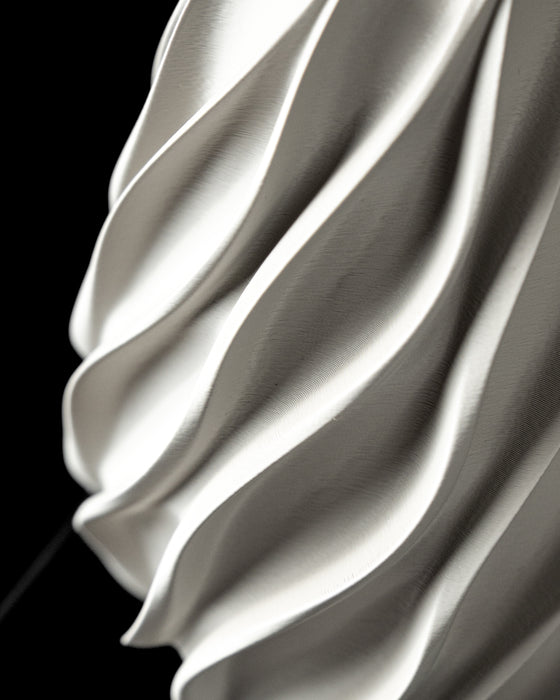Close-up of Twisted vase sweeping spiral flutes
