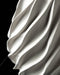 Close-up of Twisted vase sweeping spiral flutes