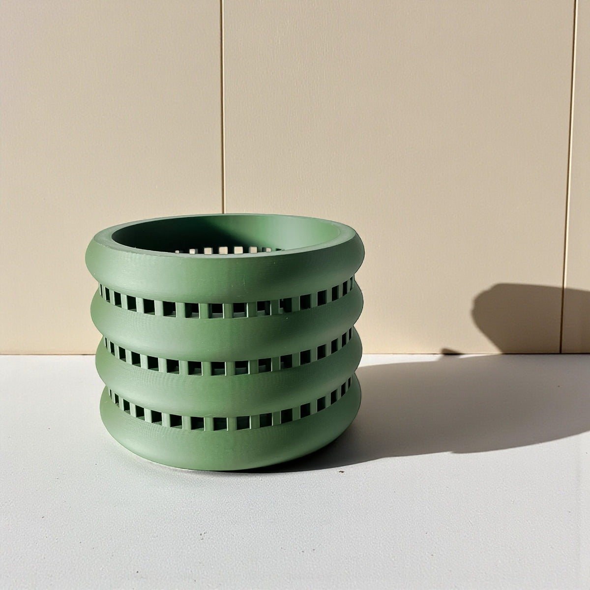 Ulra ventilated orchid pot with horizontal bands, side view