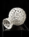 Decorative vase with complex openwork texture created through additive manufacturing, mimicking sponge or coral growth structures; visible layer lines highlight the precision of 3D printing; organic holes wrap around its surface, making it ideal for dried flowers, decorative stems, or curated floral arrangements; this piece combines nature-inspired forms with digital fabrication aesthetics.