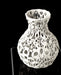 White sculptural vase with a bulbous body and sharply narrowing neck, featuring a dramatic open lattice of irregular holes inspired by cellular patterns; its layered 3D-printed surface subtly reveals the additive manufacturing process, enhancing tactile and visual depth; perfect for dried flowers, decorative stems, or curated floral arrangements, especially in modern or conceptual interiors.