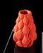 front view of colored 3d printed vase with intricate petal-inspired texture and soft matte surface finish