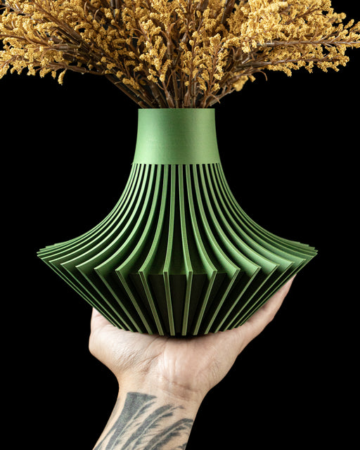 3d printed green flower vase with fluted skirt base and narrow cylindrical neck, modern sculptural design for dried floral arrangements and artistic home decor