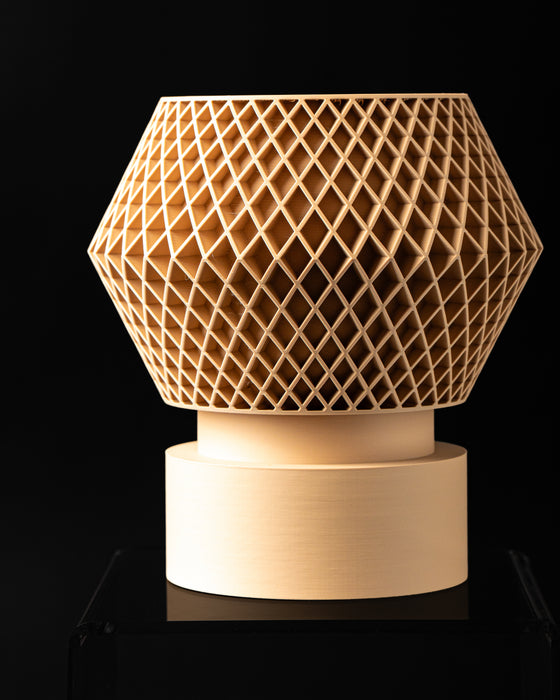 Veyra sculptural lattice planter on cylindrical pedestal, front view