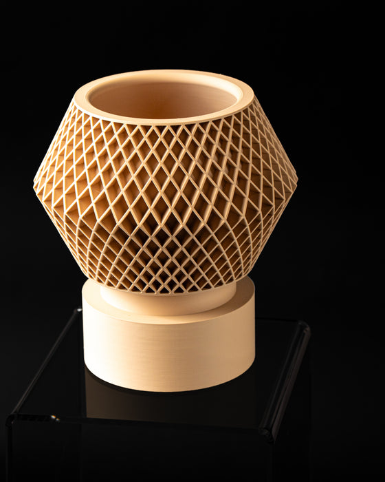 Veyra geometric lattice planter with pedestal, angled view