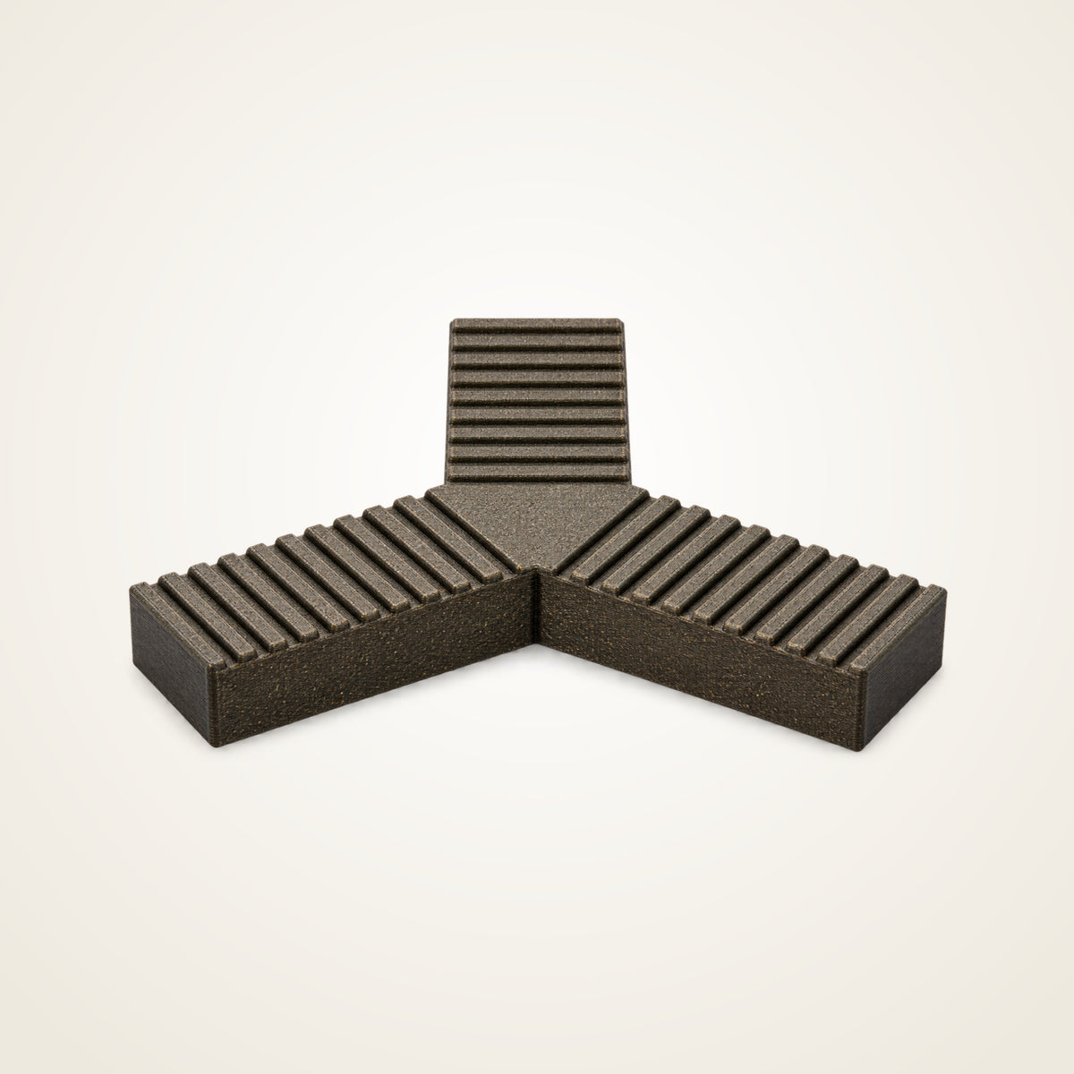 One dark brown Trivio Y-shaped ASA plant pot foot with three ribbed arms on a neutral background.