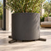 Outdoor planter supported by three separate Trivio pot feet on a contemporary patio.