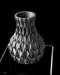 top-down perspective of 3d printed black vase with sculptural floral motif, miniature vase for dried flowers, black vase with round open mouth and deeply embossed pattern, personalized vase perfect for modern home office decor, aesthetic and modern vase for vases for flowers or unique home gift