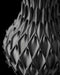 close-up of textured black vase showing rhythmic petal-inspired relief, 3d printed miniature vase with detailed surface for flower arrangements or ikebana, modern and aesthetic black vase for unique home decor, personalized vase as a one-of-a-kind unique gift for stylish interior