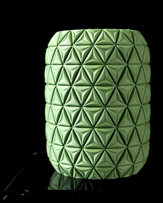 compact green flower vase with complex interlacing architecture, vertical flow of overlapping bands in sculptural symmetry, 3d printed decor for dried stems, modern minimalist decor for home and workspaces