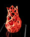 orange modern vase on display, composed of organic parametric lattice with multiple openings, flower vase for ikebana or dried botanicals, 3d printed vase with airy shape and intricate layered flow, unique decor accent for home office or living space, aesthetic vase with bright matte finish and coral-inspired contours