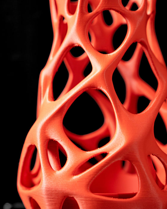vase with complex open structure and vivid orange color, made with 3d printing technology for modern flower arrangements, vase dried flowers with artistic hollowed-out form and personalized sculptural lines, organic silhouette perfect for creative floral displays, unique gift or decorative centerpiece