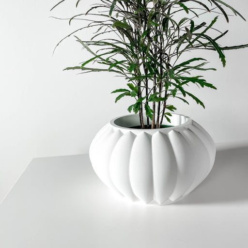Stylish white 3D printed planter pot with smooth, rounded vertical segments and contemporary geometric silhouette, modern decorative succulent pot, artistic sculptural flower planter, elegant indoor tabletop pot