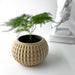 Side view displaying intricate detail of beige honeycomb-patterned planter pot, perfect as modern decorative flower pot, unique succulent planter, high-quality artistic 3D printed pot for interior decoration
