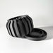 Black orchid pot with artistic geometric pattern, designed as eco-friendly planter for small orchid plants and decorative home decor