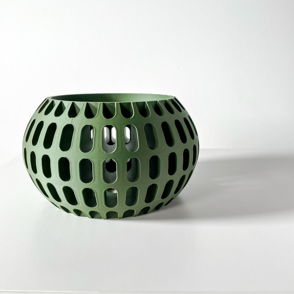 Brex rounded open grid ventilated orchid pot, side view