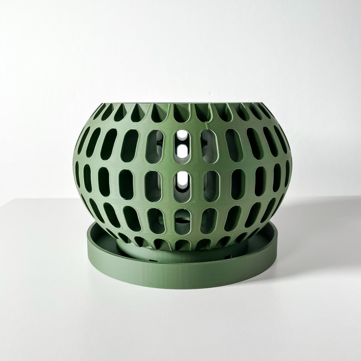 Brex rounded open grid ventilated orchid pot, indoor display view