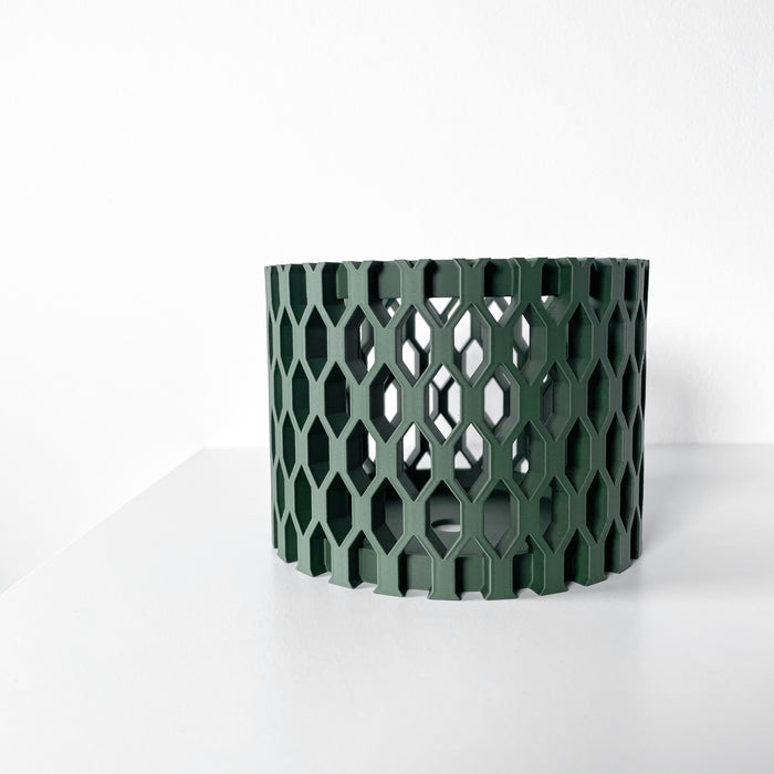 Modern orchid pot with drainage system and matching tray, functional and stylish planter for home or office.