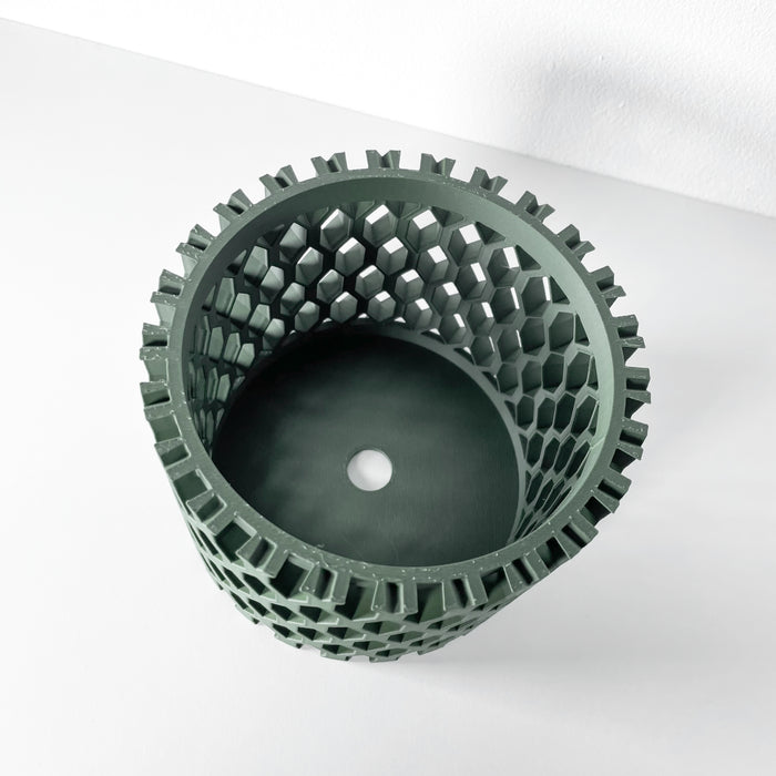 Vertical garden orchid planter in green, compact and eco-friendly 3D printed pot with geometric cutouts.