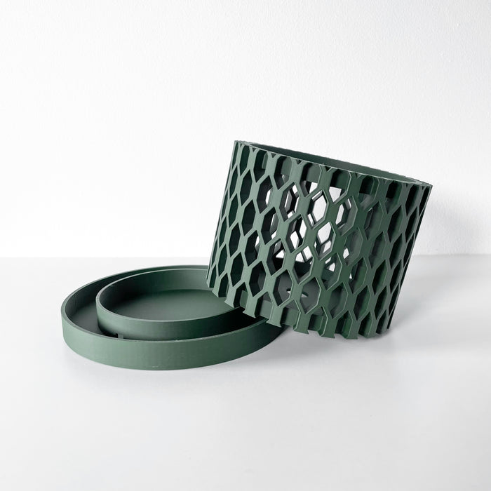 Contemporary green orchid pot with drainage, compact and decorative planter for indoor orchid lovers.