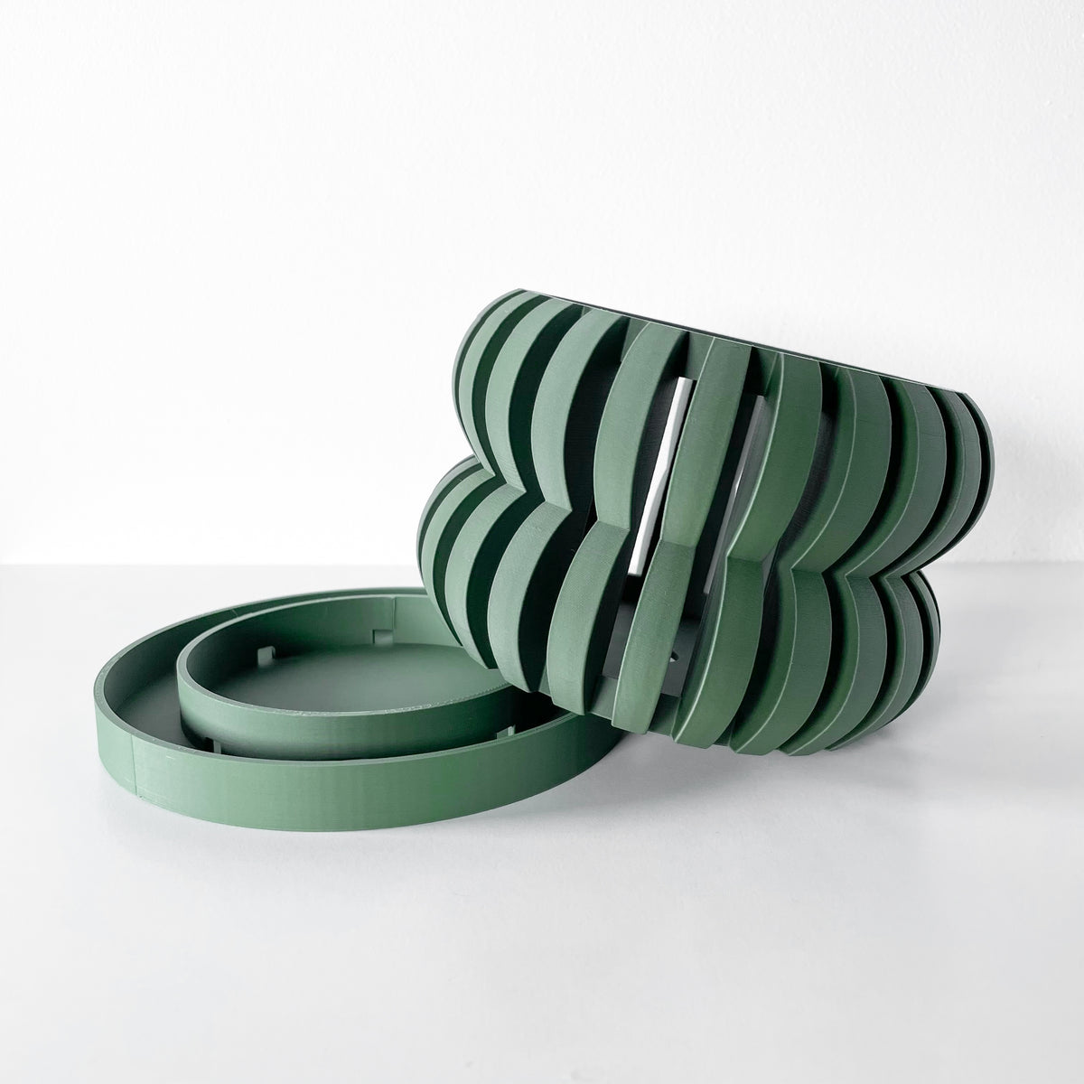Oli curved openwork ventilated orchid pot, side view