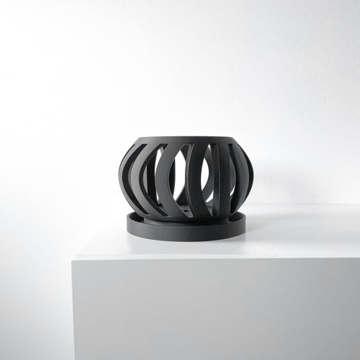 Black sculptural orchid pot with elegant 3D printed curves, ideal for modern home decor and orchid display
