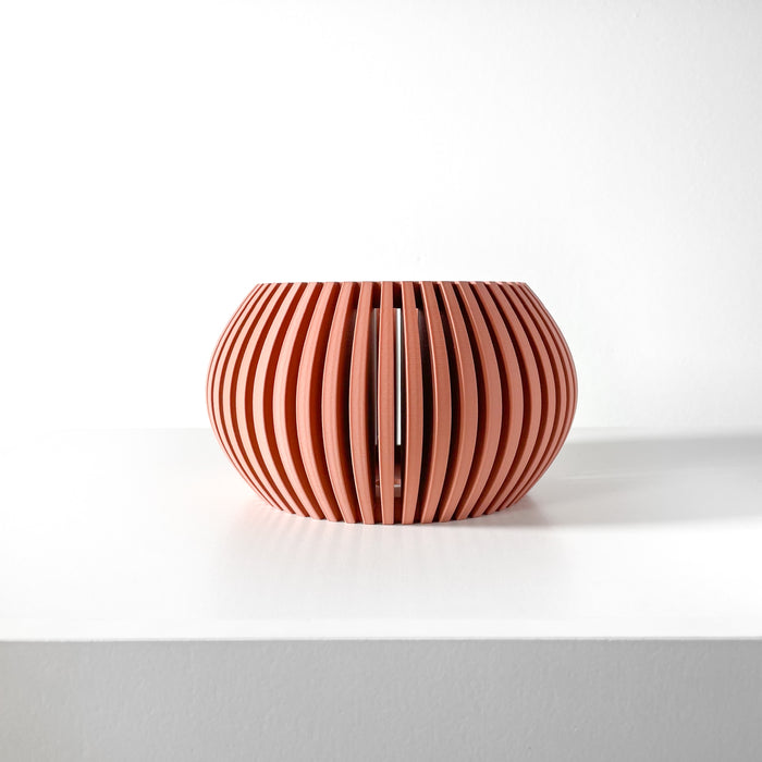 Peach ribbed 3D printed orchid pot with matching tray, designed for optimal plant drainage. This stylish and functional pot is perfect for orchids and indoor plants in modern home decor.