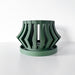 Green 3D printed orchid pot with sculptural design and drainage tray, perfect for modern indoor decor