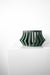 Green eco-friendly orchid planter with smart drainage, part of statement planter collection