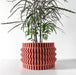 Compact 3D printed planter with bold horizontal wave ridges and cylindrical silhouette, decorative pot with layered sculptural texture
