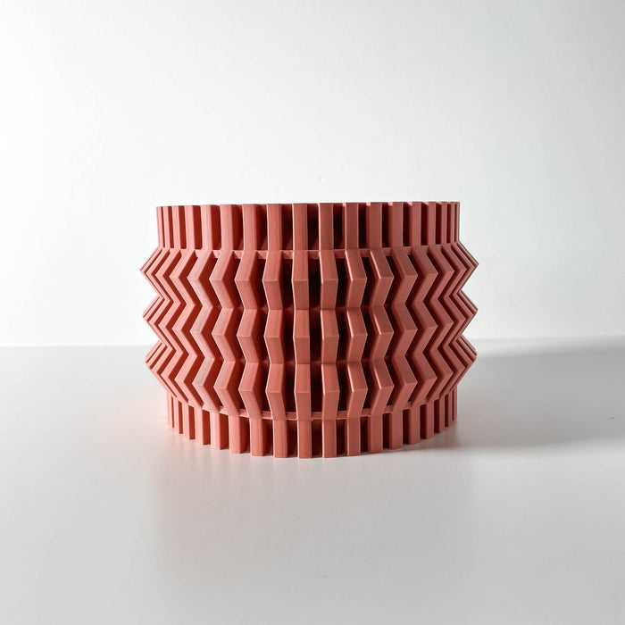Designer tabletop pot with repetitive ribbed contours and compact profile, sculptural container showcasing 3D printed ringed texture