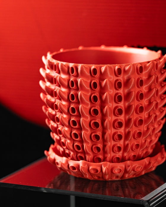 geometric plant pot with stylish lattice surface, 3D printed for eco-friendly interiors