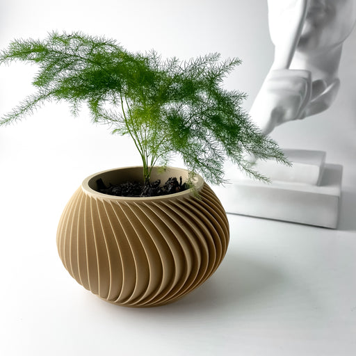 3D printed modern planter with spiral grooves and rounded silhouette, sculptural flower pot for succulents or decorative plants, ideal for artistic home decor and minimalist interiors