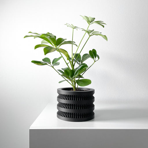Black 3D printed flower pot with stacked ring design | modern sculptural planter for stylish home decor