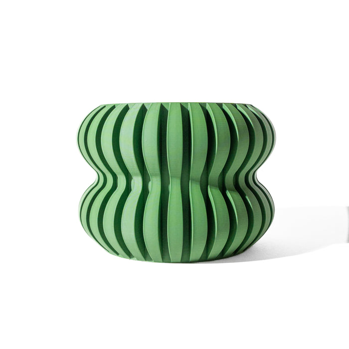 Sustainable plant pot with stylish waves and modern matte finish, 3D printed for geometric home setups and small space decor