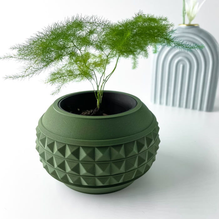 Minimalist geometric 3D printed planter pot with raised triangular texture and tapered bottom, holding green indoor plant, designed for visual impact and stability, lightweight and customizable
