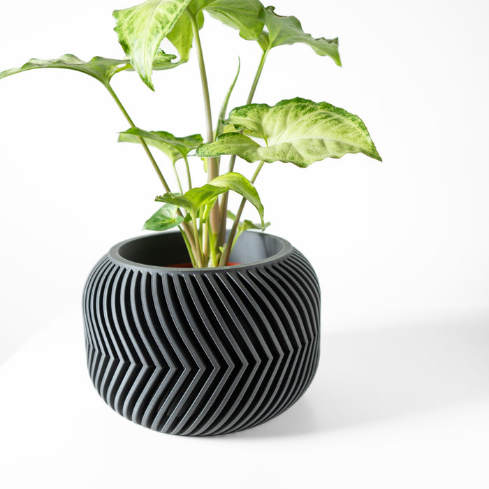 Modern geometric planter pot featuring wave-like vertical lines, 3D printed designer pot ideal for decorative interior styling and minimalist home decor