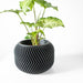 Modern geometric planter pot featuring wave-like vertical lines, 3D printed designer pot ideal for decorative interior styling and minimalist home decor