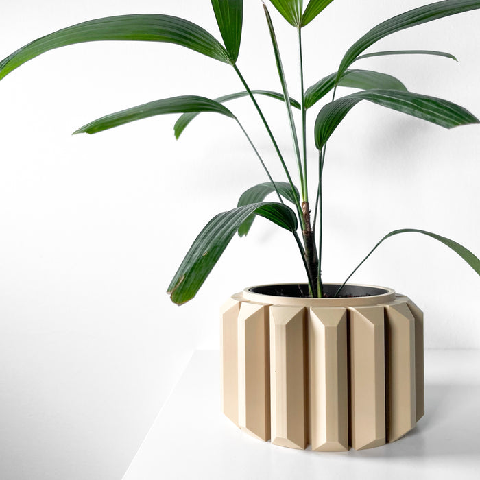 Modern cylindrical plant pot with continuous sculptural ridges wrapping vertically, viewed at a three-quarter angle